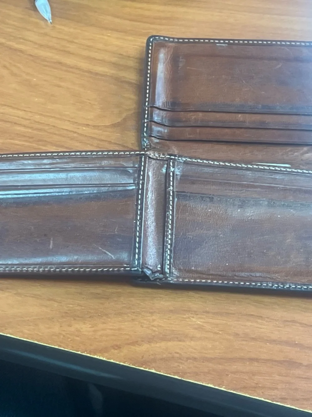 Coach brown leather trifold wallet
